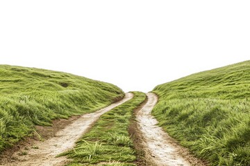 Scenic view of a winding dirt road cutting through lush green hills under a clear, white sky, evoking a sense of adventure and peace.