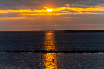 Fototapeta premium Ciboure and Saint Jean de Luz bay and sandy beach on Basque coast on sunset, famous resorts, known for beautiful architecture, nature and cuisine, South of France, Basque Country