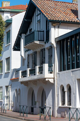White houses and villas of old Saint Jean de Luz on Basque coast, famous resort, known for beautiful architecture, nature and cuisine, South of France, Basque Country