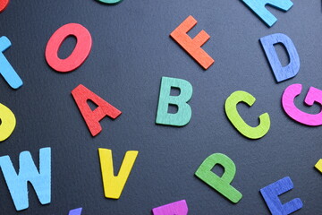 colorful letter alphabet on black background, object for education