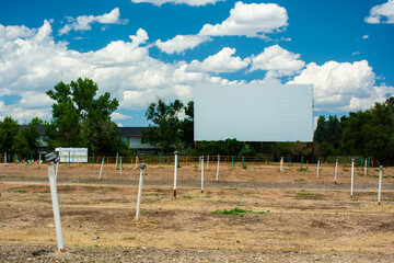 Empty Drive In Movie Theater on a Sunny Summer Day.