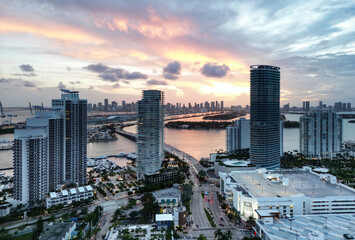 Miami Beach, South Beach at night. Miami seaside at dusk. Aerial view of evening Miami Beach and cityscape. Coastline of Miami Beach night shot from the air drone.