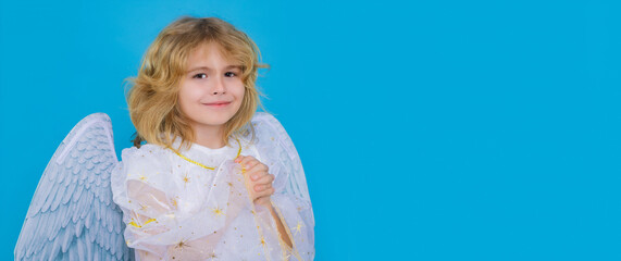 Kid wearing angel costume white dress and feather wings. Innocent child. Panoramic banner, wide poster, horizontal header.