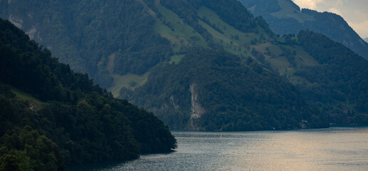 Alpine mountains in Switzerland. Hiking in the Swiss Alps mountains during summer, hiking trail in...