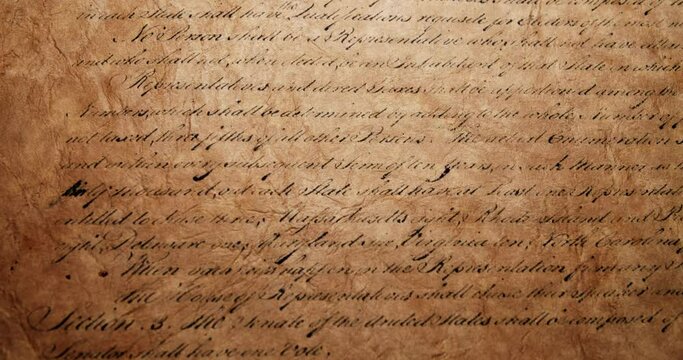 Panning cross the US American declaration of independence, stopping at We The People on old style parchment. For American Independence Day on the 4th of July, or other patriotic American celebrations.