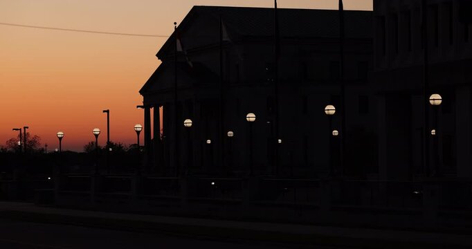 Jackson, Mississippi, USA - April 23, 2024: Twilight light shines on the historic Civic Center buildings of downtown Jackson.