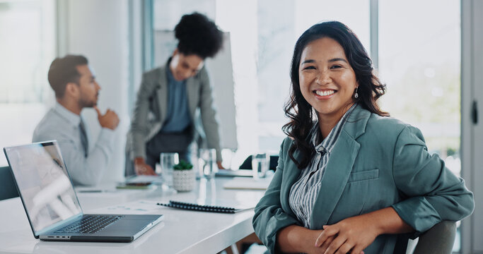 Laptop, portrait and business woman in meeting at office for company budget planning with revenue. Smile, computer and Asian female financial analyst with team for corporate stock investment pride - Powered by Adobe