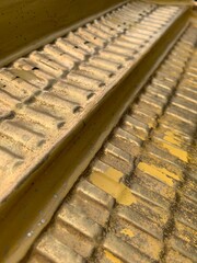 The roof is painted gold, partially peeled off background