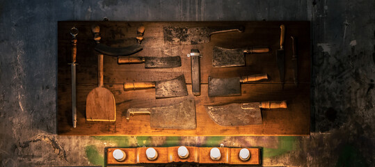 Medieval kitchen set display on wood board.