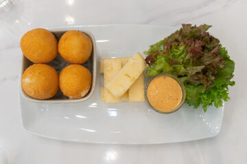 Top view, Cheese ball on plate.