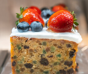 sliced fruit cake with mixed fruit.
