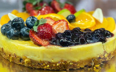 Cheesecake with fruit. Side view.