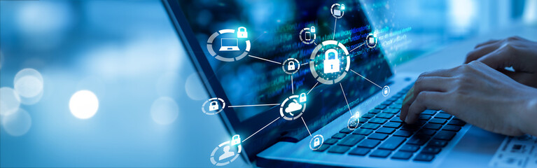 Young businesswoman is using laptop for cyber security protection.cyber security concept, user...