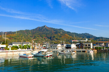 Fototapeta premium The ferry heading to Okunoshima or Rabbit island in Hiroshima island, Chugoku, Japan.