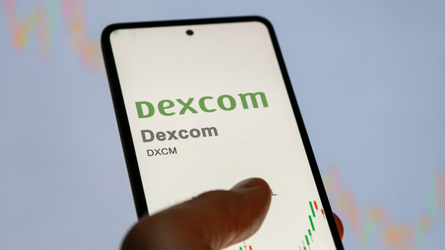 April 09th 2024 , San Diego, California. Close up on logo of Dexcom on the screen of an exchange. Dexcom price stocks, $DXCM on a device.