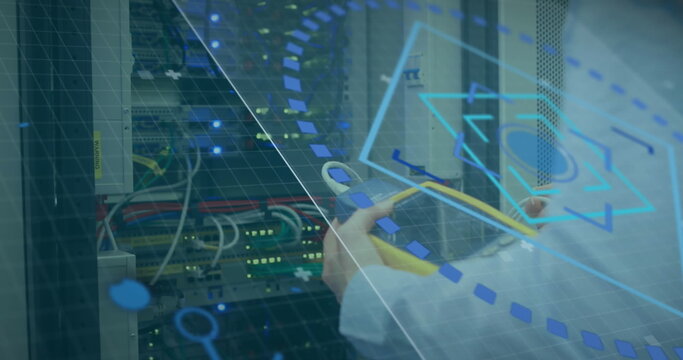 Image of scope and round scanner over mid section of male engineer working at server room