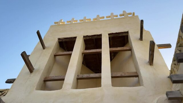 Traditional architecture of windcatcher the passive design construction the seaside beach rural village countryside in arabian culture in tropical rainforest weather climate in iran nature landscape