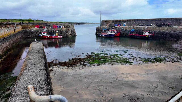 Ireland Epic Locations Slade Harbour at low tide with boatsmquiet little place on The Hook Peninsula Wexford
