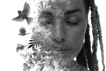 A black and white conceptual paintography portrait of a young woman
