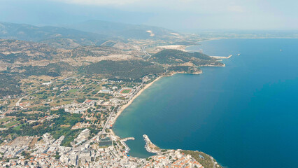 Kavala, Greece. Coast of Aegean Sea with beaches and city. Panoramic view. Summer, Aerial View