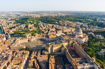 Rome, Italy. St. Peter's Cathedral - Basilica di San Pietro. Panorama of the city on a summer morning. Sunny weather. Aerial view