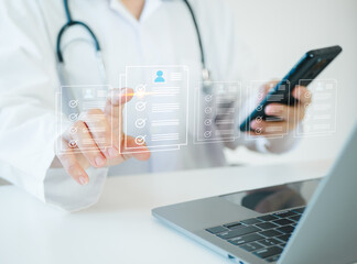 Medicine doctor use laptop to review patient medical records on virtual screens for digital healthcare. Review medical reports carefully and diagnose illnesses for an effective treatment plan.	