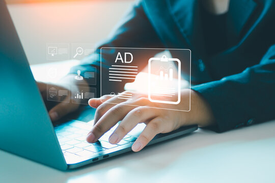 Digital marketing commerce online sale concept, Businesswoman use laptop with advertising on website. planning advertising marketing strategies to target social media native, ad, advertisers, sales.