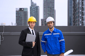 Engineers are checking cooling system at rooftop.