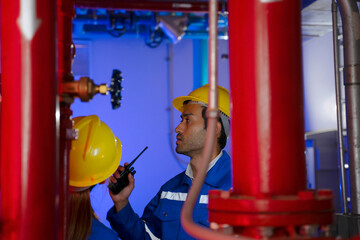 Engineers are checking water system at basement.