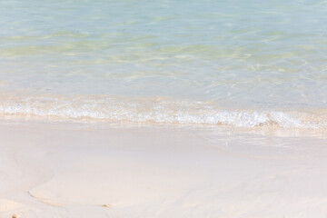 White sand on the seashore as an abstract background. Texture