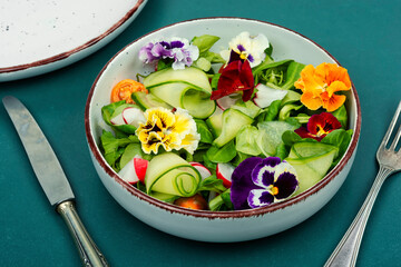 Vitamin vegetable salad with flowers.