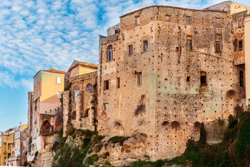 scenic travel landscape of beautiful historic town Tropea in Italy with old antique buildings,...