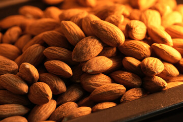 Close to Group Almonds on tray in the oven.