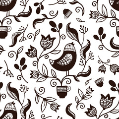 Ukrainian traditional ethnic national pattern, in which the central place is occupied by a bird surrounded by flowers. Bird with plant, flowers in cup with ethnic elements, black and white