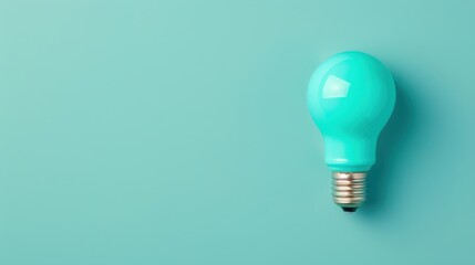 A stylish and minimalist composition featuring a blue lightbulb on a plain background, symbolizing creativity and innovation. The image offers ample copy space for customization.