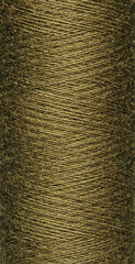 macro texture of a skein of green sewing thread