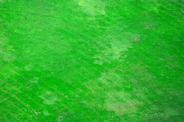Green grunge texture background. Backdrop ideal for creating a vintage or edgy feel