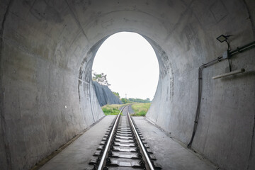 Obraz premium The entrance of the railway tunnel at Khao Phra Phutthachai, Saraburi, Thailand
