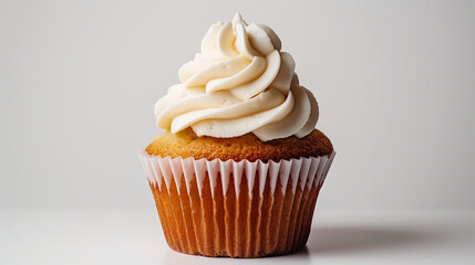 Minimalist Delight: Cupcake with White Icing Captured in Studio Setting