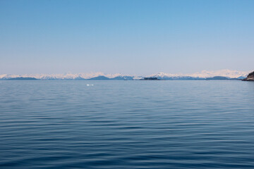 seascape and snow mountains