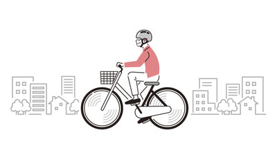 ヘルメットを装着して自転車をこぐシニア男性