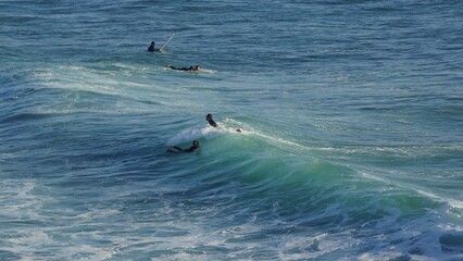 Surfing / Riding waves at Banana Beach Agadir Morocco