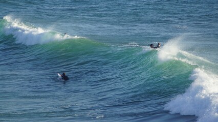 Surfing / Riding waves at Banana Beach Agadir Morocco