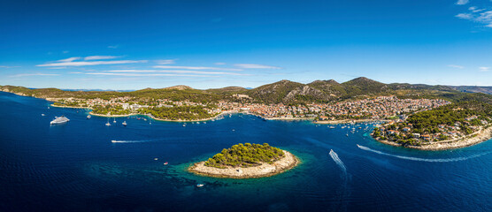 Aerial view of picturesque Hvar island with clear blue ocean and scenic mountains, Split-Dalmatia, Croatia.