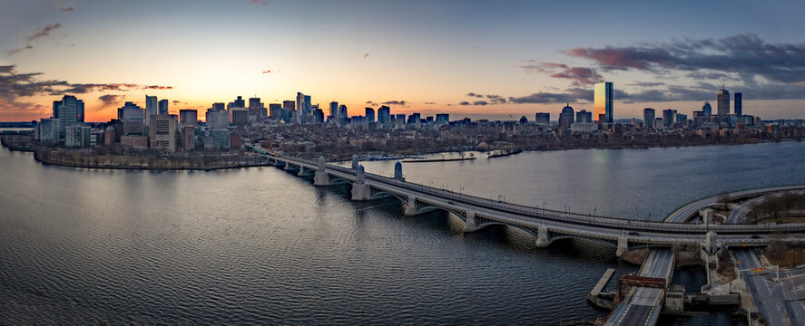 Aerial view of Longfellow Bridge and cityscape at sunset over the river, Cambridge, Massachusetts, United States.