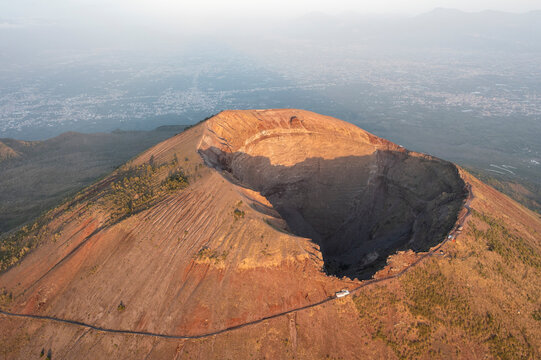 Aerial view of majestic Vesuvius volcano crater and surrounding landscape, Herculaneum, Italy.