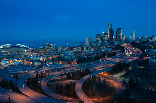 Aerial view of downtown Seattle skyline with Interstate 5 & 90 Interchange at night, Washington, United States.