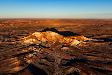 Aerial view of Painted Desert and Arckaringa hills at sunset, Mount Willoughby, South Australia, Australia.