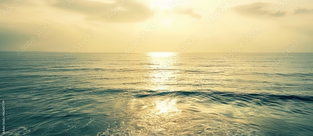 Aufkleber high quality photo of a serene seascape with golden hour lighting, ideal for use as a copy space ima