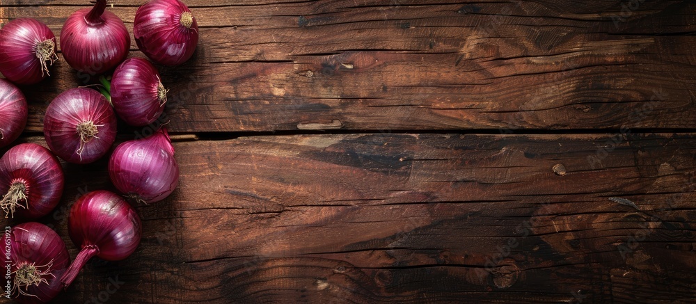 Poster Rustic wood background with red onions creating a captivating composition for copy space image.